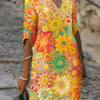 Nira | Lebhaftes Blumen-Midi-Kleid
